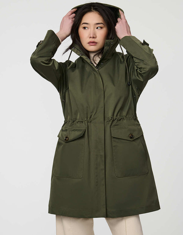 Elstead Raincoat for women featuring oversized patch pockets and adjustable waist for rainy days.