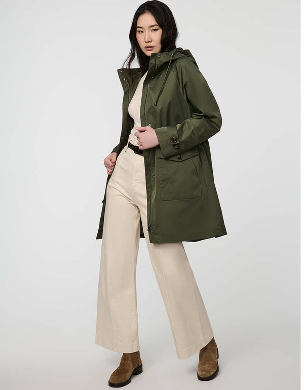 Elstead Raincoat for women featuring oversized patch pockets and adjustable waist for rainy days.