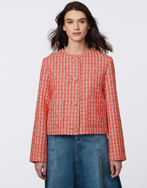 Cropped tweed jacket with collarless design, refined tailoring, and tonal buttons. Classic femininity with modern style, perfect for denim or dress pairings.