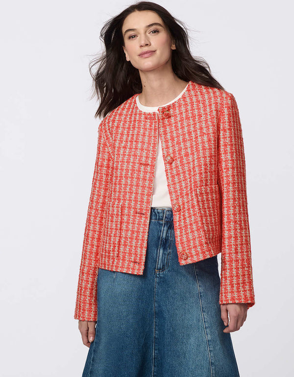 Cropped tweed jacket with collarless design, refined tailoring, and tonal buttons. Classic femininity with modern style, perfect for denim or dress pairings.