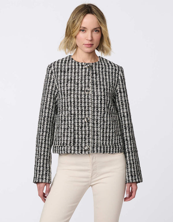 Cropped tweed jacket with collarless design, refined tailoring, and tonal buttons. Classic femininity with modern style, perfect for denim or dress pairings.