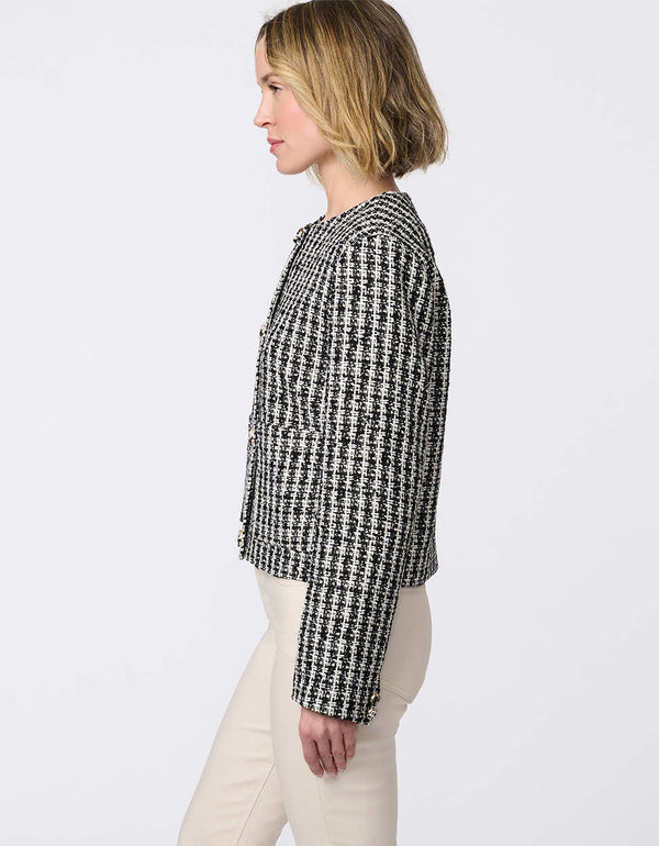 Cropped tweed jacket with collarless design, refined tailoring, and tonal buttons. Classic femininity with modern style, perfect for denim or dress pairings.