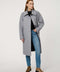 Women’s plaid wool coat with oversized calf-length fit, dramatic collar, and two-button single-breasted front.