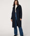 Women’s plaid wool coat with oversized calf-length fit, dramatic collar, and two-button single-breasted front.