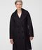 Calf-length double-breasted wool coat with oversized lapels, offering timeless sophistication and warmth.