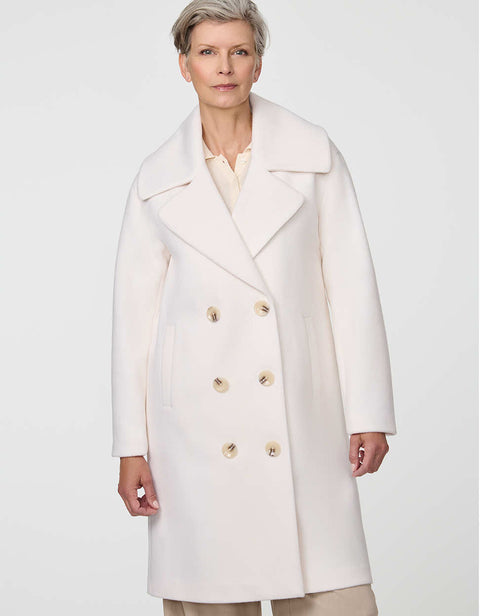 Calf-length double-breasted wool coat with oversized lapels, offering timeless sophistication and warmth.