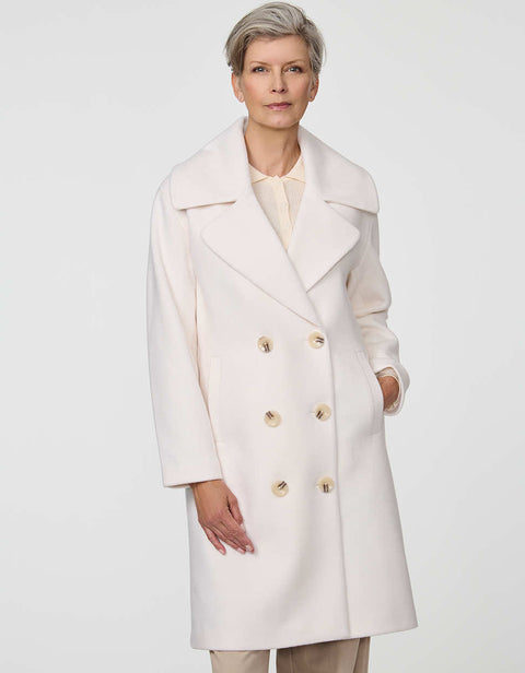 Calf-length double-breasted wool coat with oversized lapels, offering timeless sophistication and warmth.