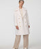 Calf-length double-breasted wool coat with oversized lapels, offering timeless sophistication and warmth.