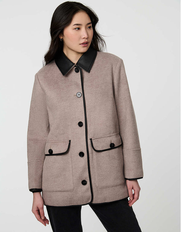 Pennlock Utility Coat for women blending wool-feel knit and faux leather with patch pockets.