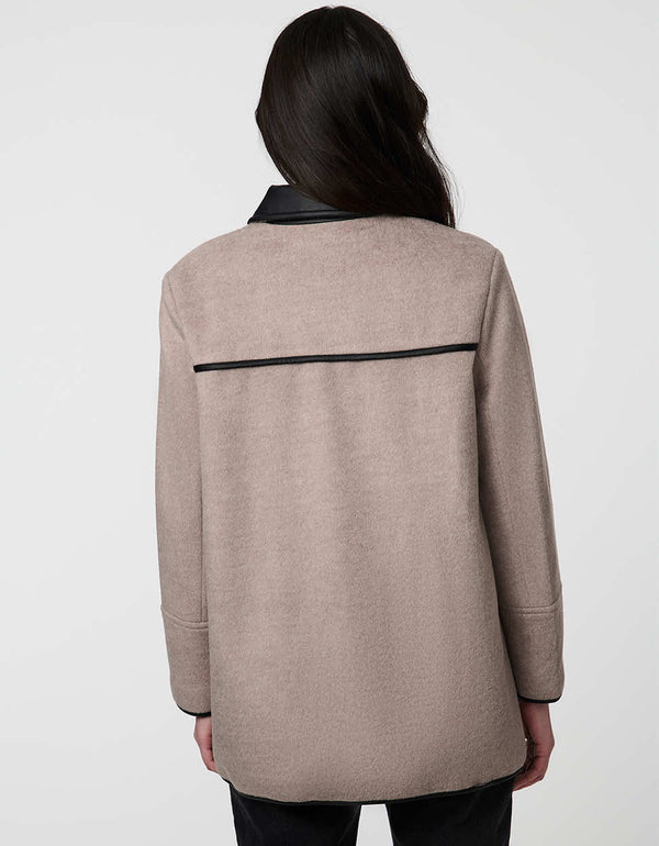 Pennlock Utility Coat for women blending wool-feel knit and faux leather with patch pockets.