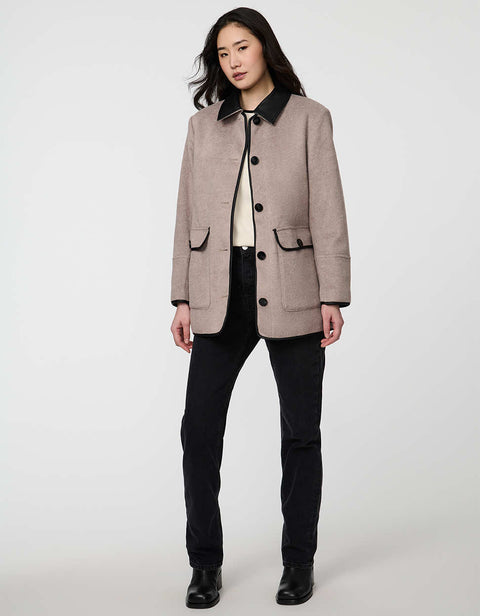 Pennlock Utility Coat for women blending wool-feel knit and faux leather with patch pockets.