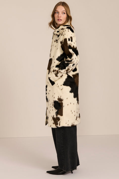 Women's faux calf hair car coat with oversized collar, button-front closure and cuff-tab details.