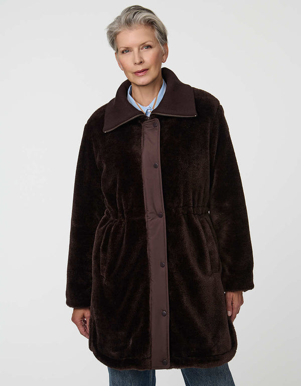 Plush Briarfield Sherpa Anorak featuring zip-up collar, cinched waist, and modern silhouette.