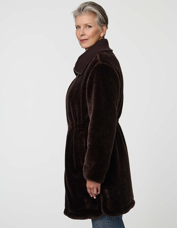 Plush Briarfield Sherpa Anorak featuring zip-up collar, cinched waist, and modern silhouette.