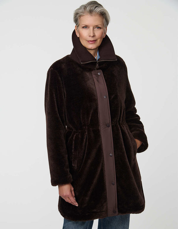 Plush Briarfield Sherpa Anorak featuring zip-up collar, cinched waist, and modern silhouette.