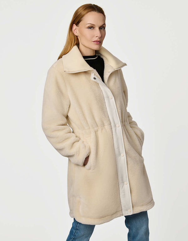 Plush Briarfield Sherpa Anorak featuring zip-up collar, cinched waist, and modern silhouette.