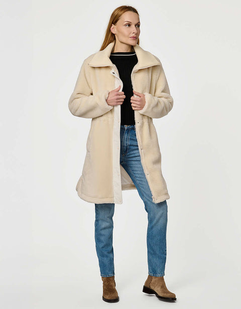 Plush Briarfield Sherpa Anorak featuring zip-up collar, cinched waist, and modern silhouette.