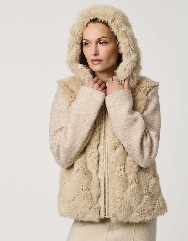 Hip-length faux fur coat with jacquard diamond pattern, wool sleeves, cozy hood, and zip closure for modern style.