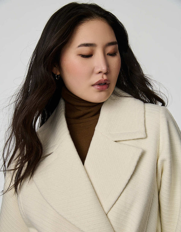 Women's Whitaker Twill Coat with double-breasted wrap design and sleek welt pockets.