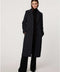 Women’s knee-length wool coat with tailored darts, patch pockets, and single-breasted three-button front.