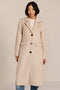 Women’s knee-length wool coat with tailored darts, patch pockets, and single-breasted three-button front.