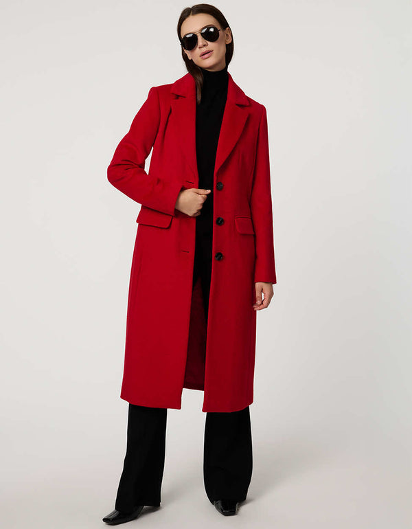 Women’s knee-length wool coat with tailored darts, patch pockets, and single-breasted three-button front.