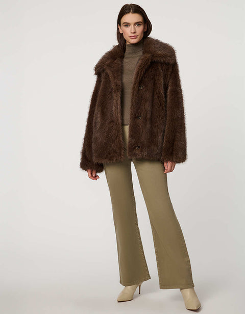 Hip-length faux fur coat with oversized collar, four-button single-breasted front, and welt pockets.