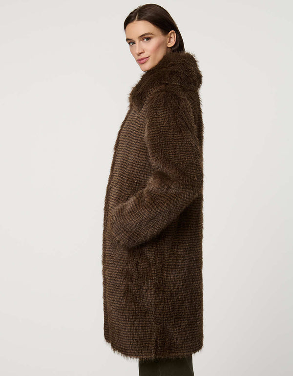 Knee-length ostrich-textured faux fur coat with oversized collar, discreet clip closures, and welt pockets.