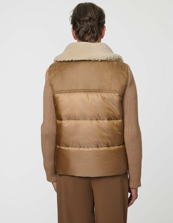 Breck Puffer Jacket combining a puffer body with knit sleeves and faux shearling collar.
