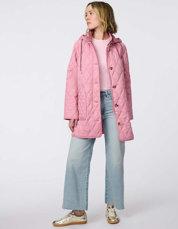 Lightweight quilted puffer jacket for women. The perfect spring layer with drawstring hood and oversized pockets,