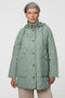 Lightweight quilted puffer jacket for women. The perfect spring layer with drawstring hood and oversized pockets,