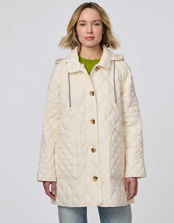 Lightweight quilted puffer jacket for women. The perfect spring layer with drawstring hood and oversized pockets,