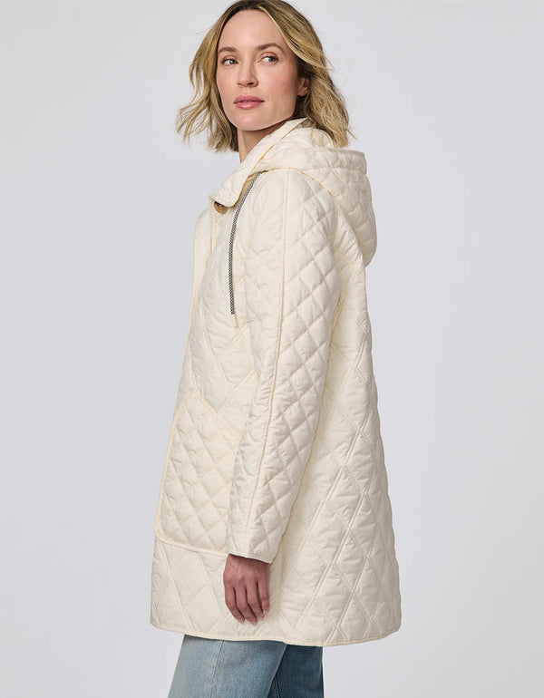 Lightweight quilted puffer jacket for women. The perfect spring layer with drawstring hood and oversized pockets,