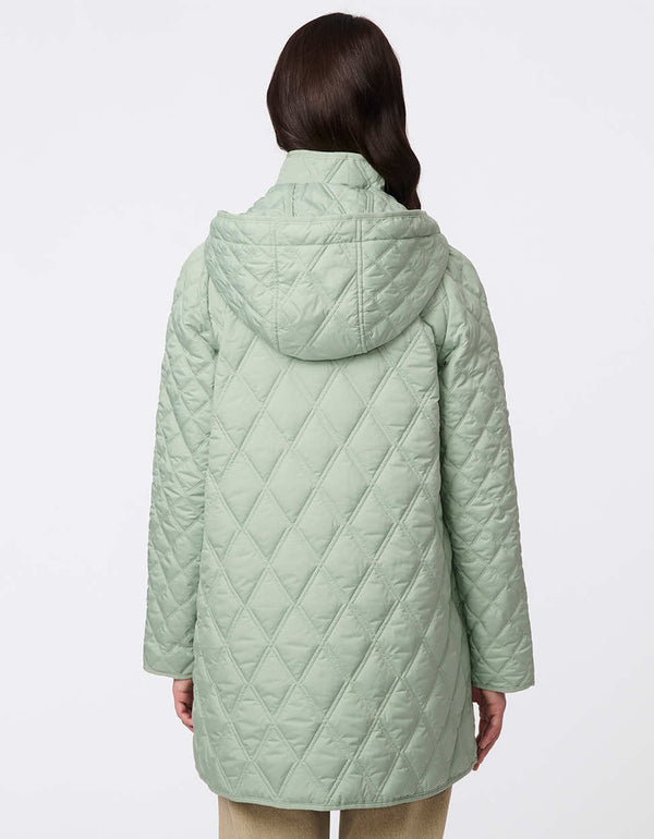 Lightweight quilted puffer jacket for women. The perfect spring layer with drawstring hood and oversized pockets,