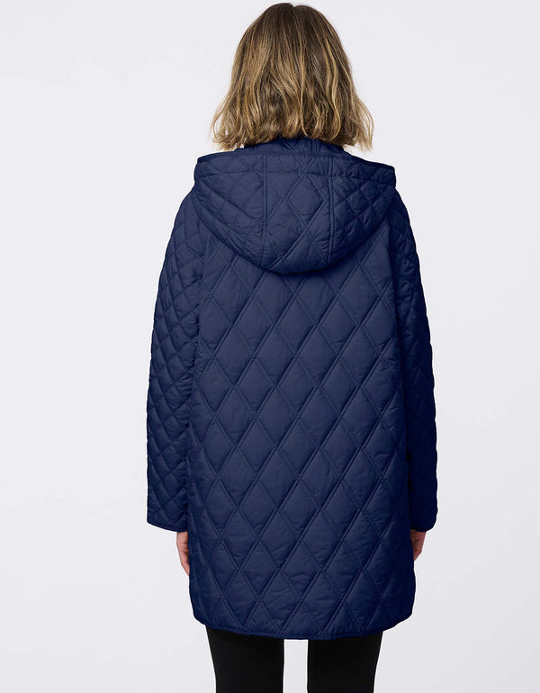 Lightweight quilted puffer jacket for women. The perfect spring layer with drawstring hood and oversized pockets,