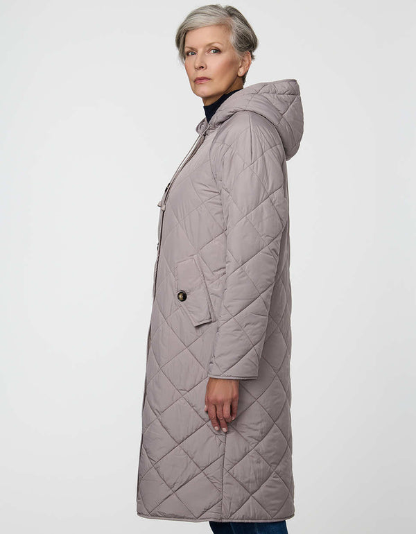 Merrick Quilted Puffer Coat with diamond quilting, welt pockets, and knee-length fit.
