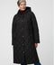 Merrick Quilted Puffer Coat with diamond quilting, welt pockets, and knee-length fit.