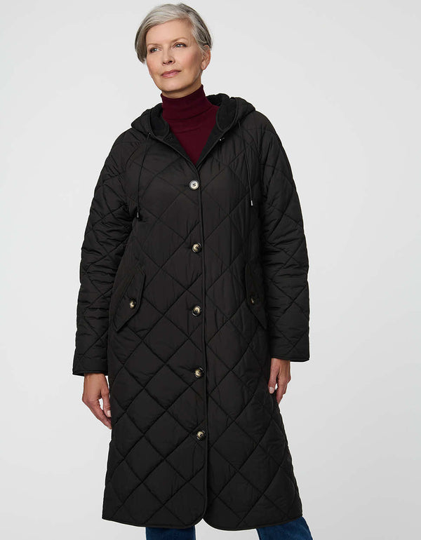 Merrick Quilted Puffer Coat with diamond quilting, welt pockets, and knee-length fit.