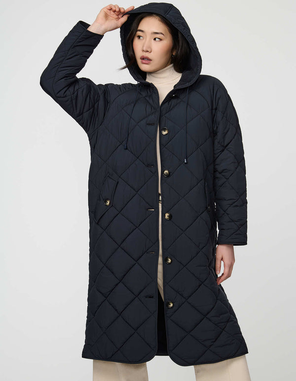 Merrick Quilted Puffer Coat with diamond quilting, welt pockets, and knee-length fit.