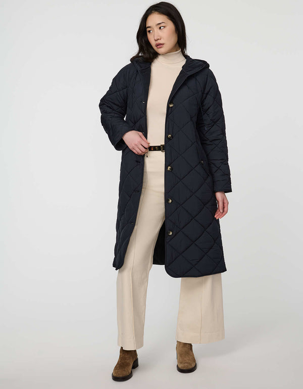 Merrick Quilted Puffer Coat with diamond quilting, welt pockets, and knee-length fit.