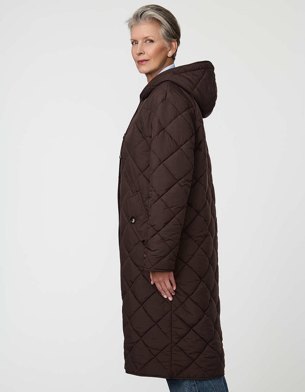 Merrick Quilted Puffer Coat with diamond quilting, welt pockets, and knee-length fit.