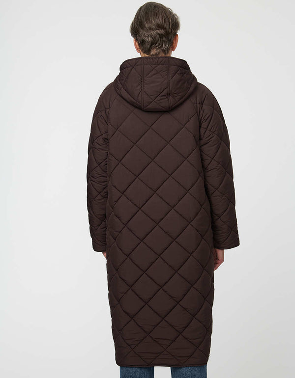 Merrick Quilted Puffer Coat with diamond quilting, welt pockets, and knee-length fit.