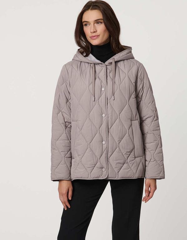 Oversized quilted puffer jacket with diamond stitching, drawstring hood, welt pockets, and snap front closures.