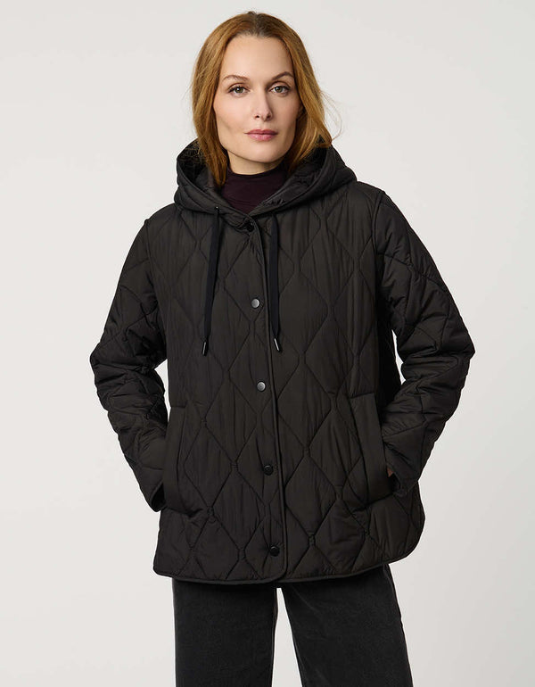 Oversized quilted puffer jacket with diamond stitching, drawstring hood, welt pockets, and snap front closures.