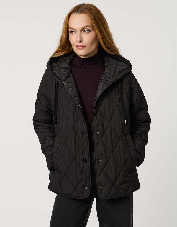 Oversized quilted puffer jacket with diamond stitching, drawstring hood, welt pockets, and snap front closures.