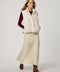 Women’s quilted puffer vest with oversized fit, funnel collar, zipper closure, and lightweight Ecoplume fill.