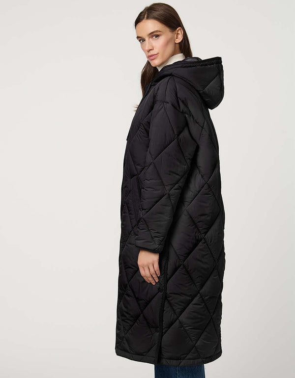 Oversized long puffer coat with diamond quilting, corduroy trim, hood, welt pockets, and Ecoplume insulation.