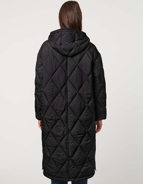 Oversized long puffer coat with diamond quilting, corduroy trim, hood, welt pockets, and Ecoplume insulation.