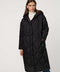 Oversized long puffer coat with diamond quilting, corduroy trim, hood, welt pockets, and Ecoplume insulation.