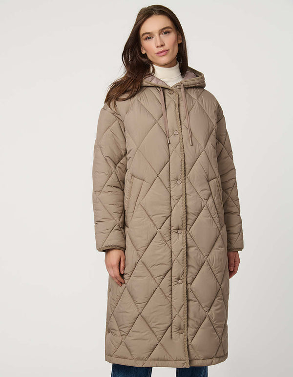 Oversized long puffer coat with diamond quilting, corduroy trim, hood, welt pockets, and Ecoplume insulation.
